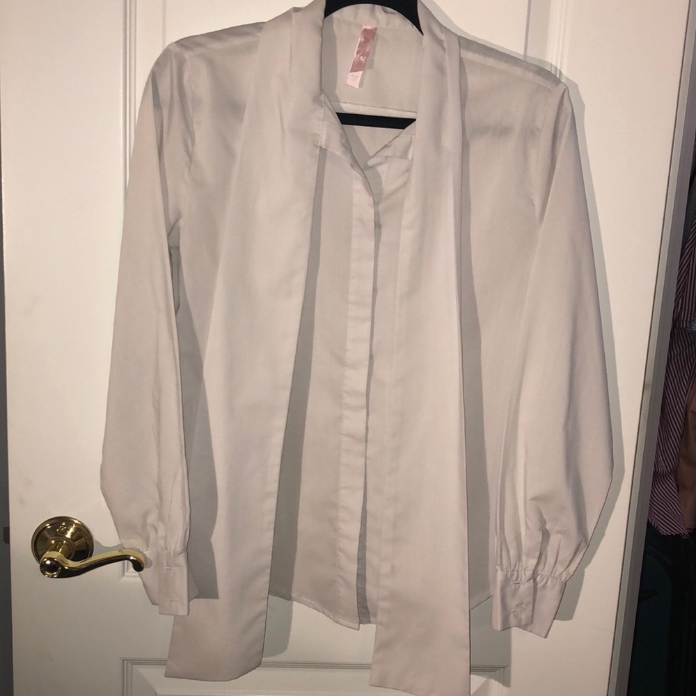 White botton down with bow